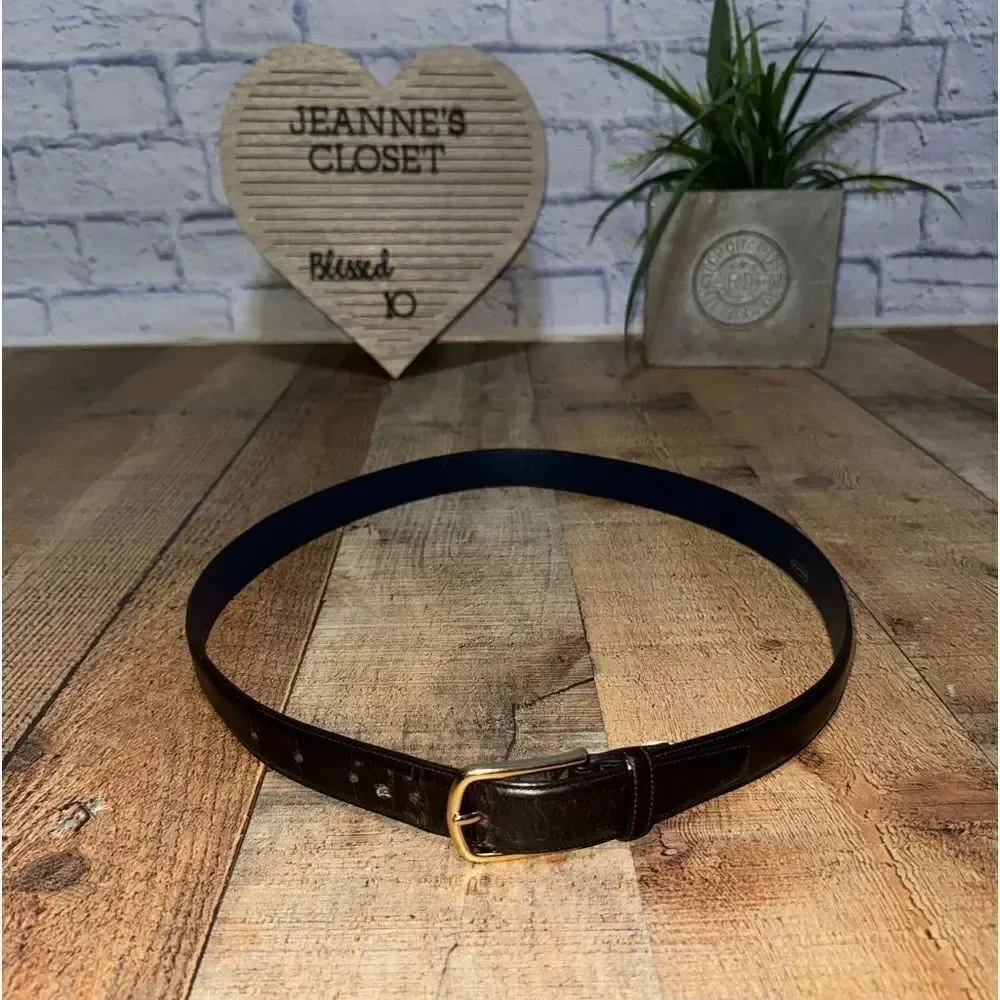 Black leather coach belt *has flaw